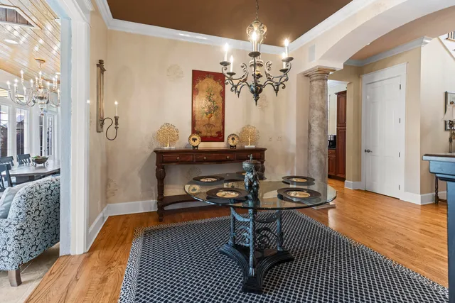 an aerial view of a house yard swimming pool and outdoor seating