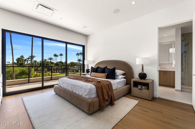 a view of a back yard from a balcony