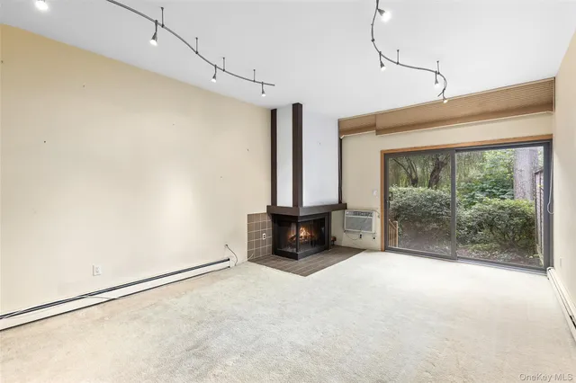 a living room with large windows