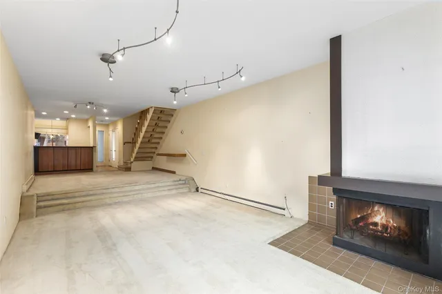 a view of a livingroom with a fireplace