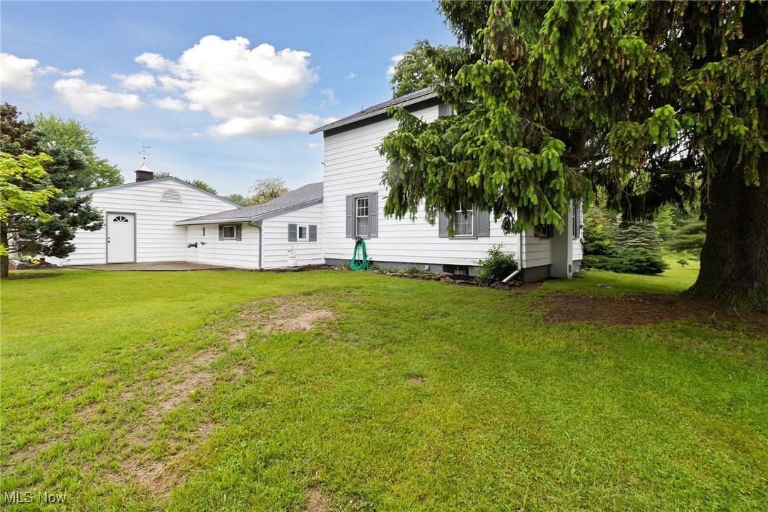 2860 Middle Road Pierpont, OH 44082 - Photo 28 of 50 View of green lawn with a patio