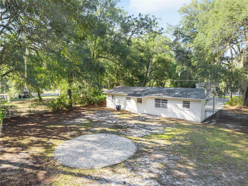 2511 Northeast 3rd Place Gainesville, FL 32641 - Photo 27 of 29 a view of a house with a yard