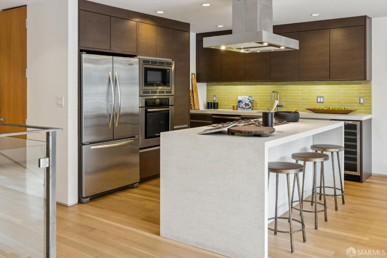 392 Eureka Street San Francisco, CA 94114 - Photo 28 of 74 a kitchen with stainless steel appliances a refrigerator and a stove