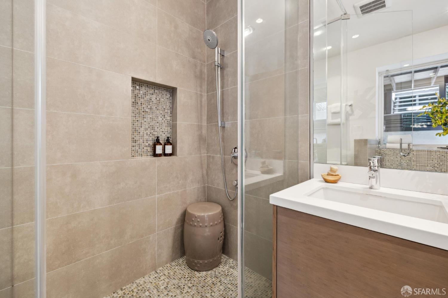 392 Eureka Street San Francisco, CA 94114 - Photo 55 of 74 a bathroom with a sink a toilet and shower