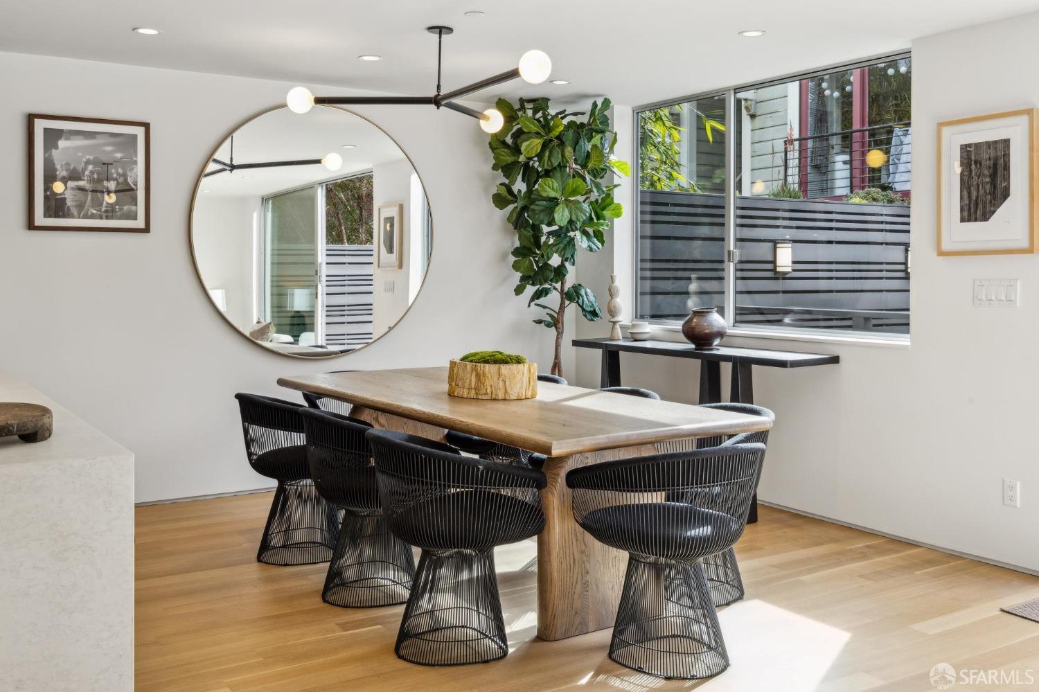 392 Eureka Street San Francisco, CA 94114 - Photo 7 of 74 a view of a dining room with furniture and wooden floor