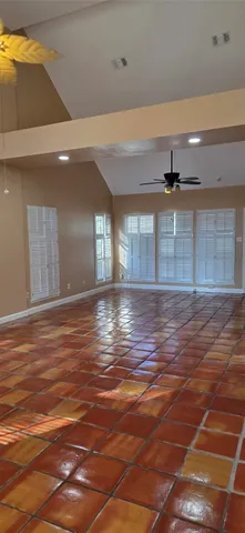 a view of lot of kitchen and empty room