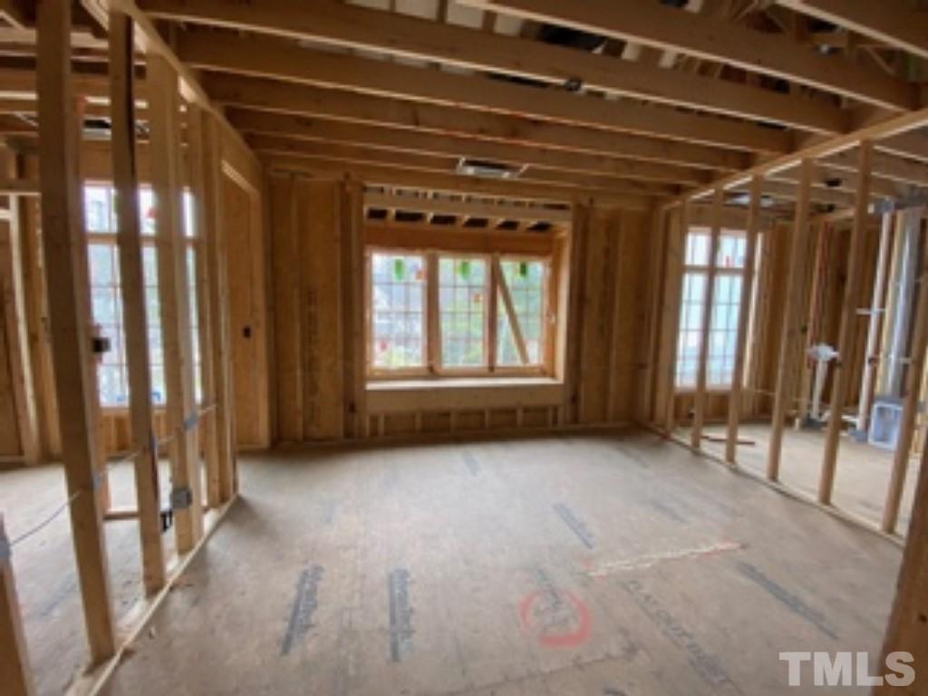 3431 Redbud Lane Raleigh, NC 27607 - Photo 7 of 11 a view of an empty room with a window