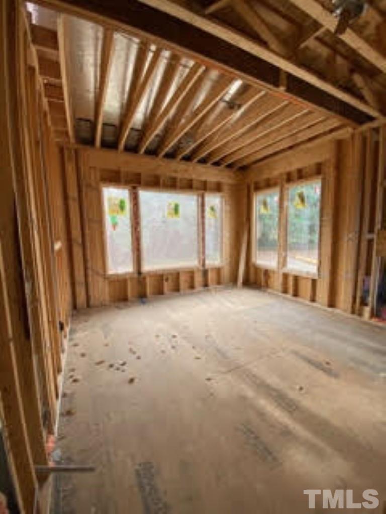 3431 Redbud Lane Raleigh, NC 27607 - Photo 10 of 11 a view of an empty room with a window