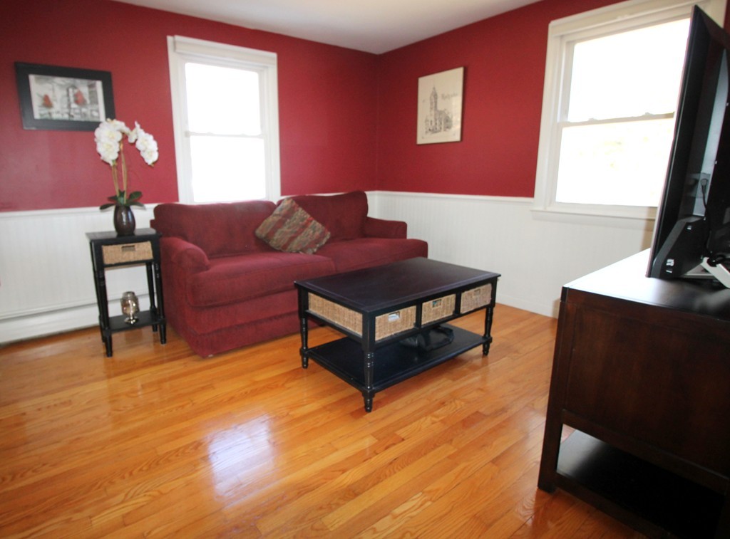 40 Lenox Road Holyoke, MA 01040 - Photo 11 of 30 a living room with furniture and a window