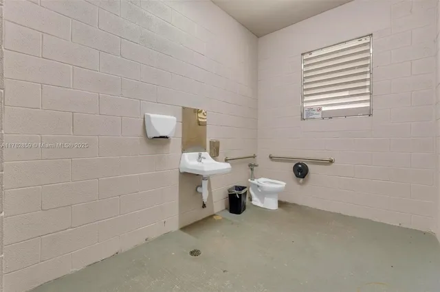 a bathroom with a sink and a toilet