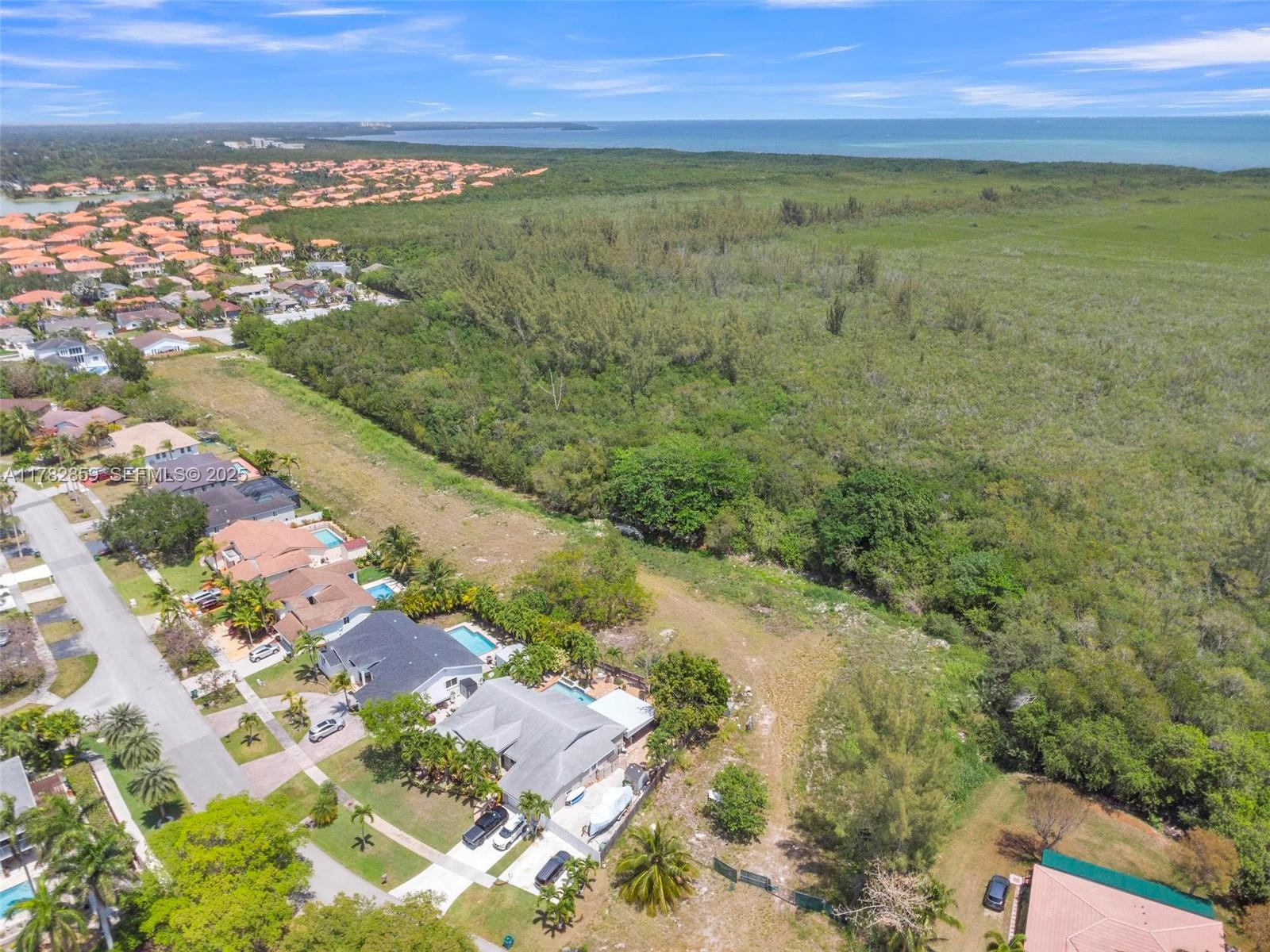 7830 Southwest 199th Terrace Cutler Bay, FL 33189 - Photo 2 of 30 a view of city and ocean