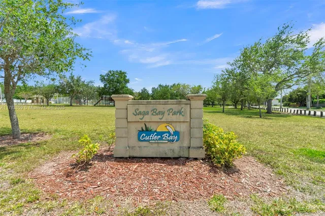 a sign board with an ocean view
