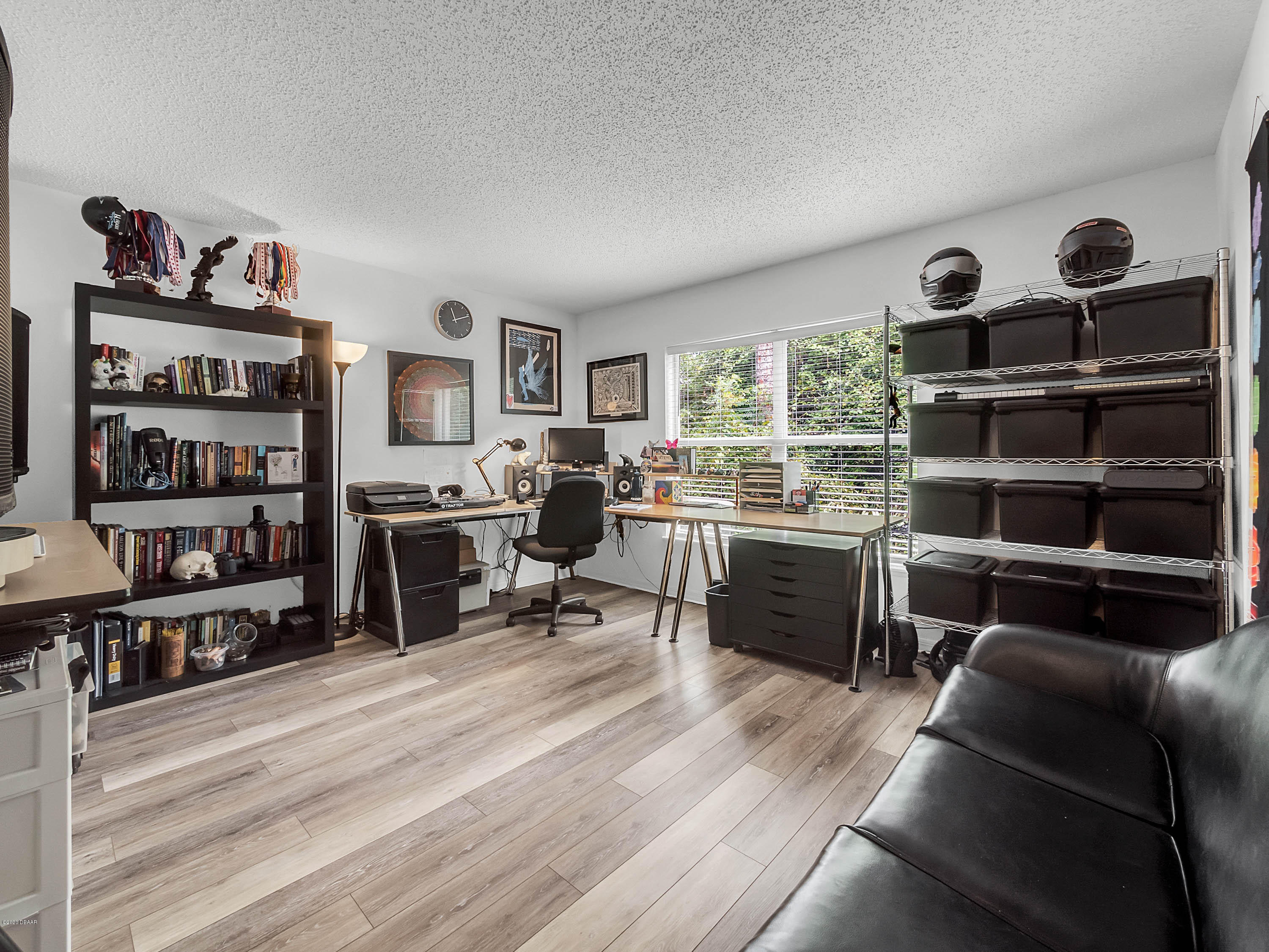 1982 7th Avenue DeLand, FL 32724 - Photo 11 of 36 a view of a livingroom with workspace and a window