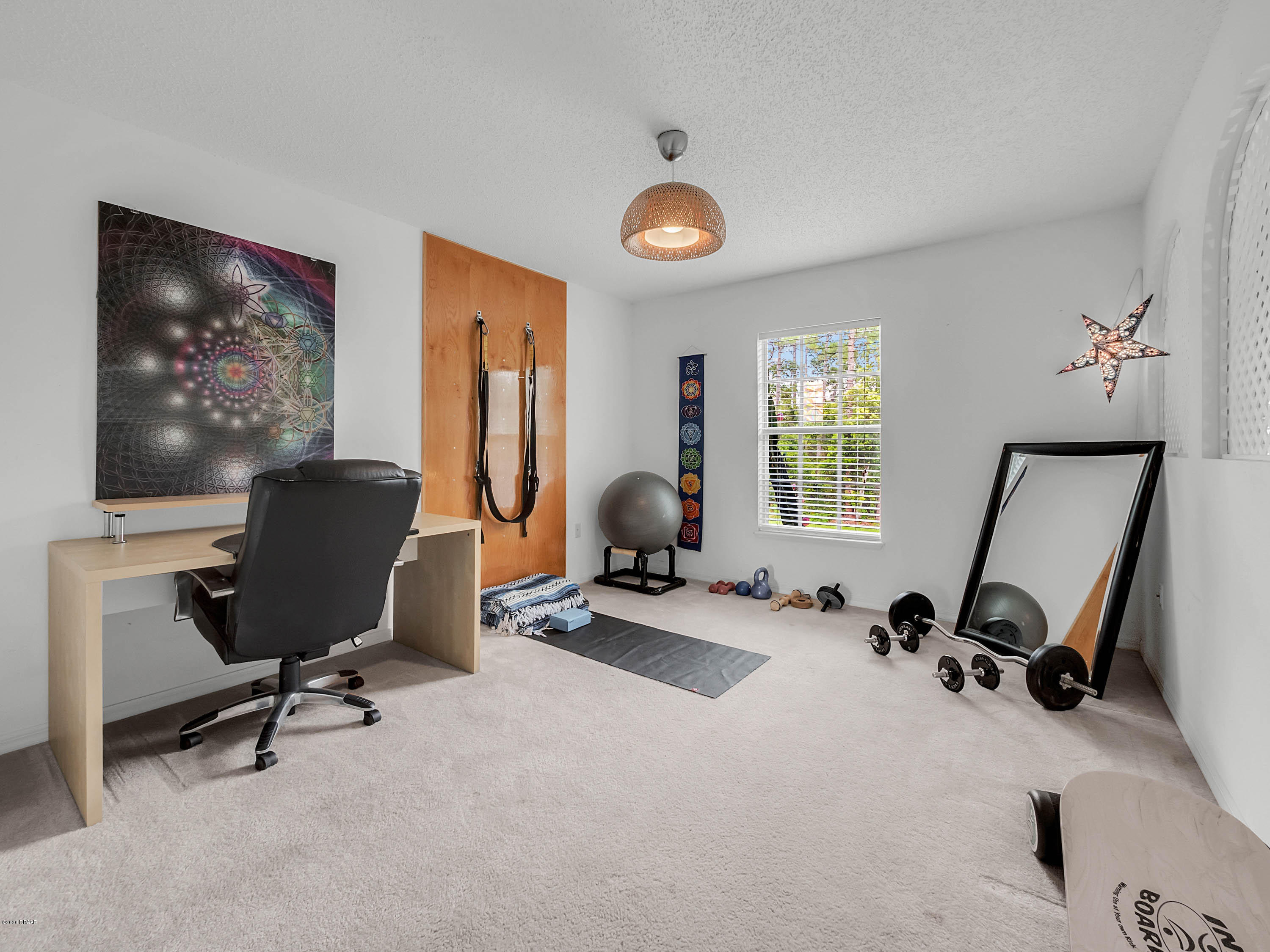 1982 7th Avenue DeLand, FL 32724 - Photo 21 of 36 a view of a workspace with gym equipment
