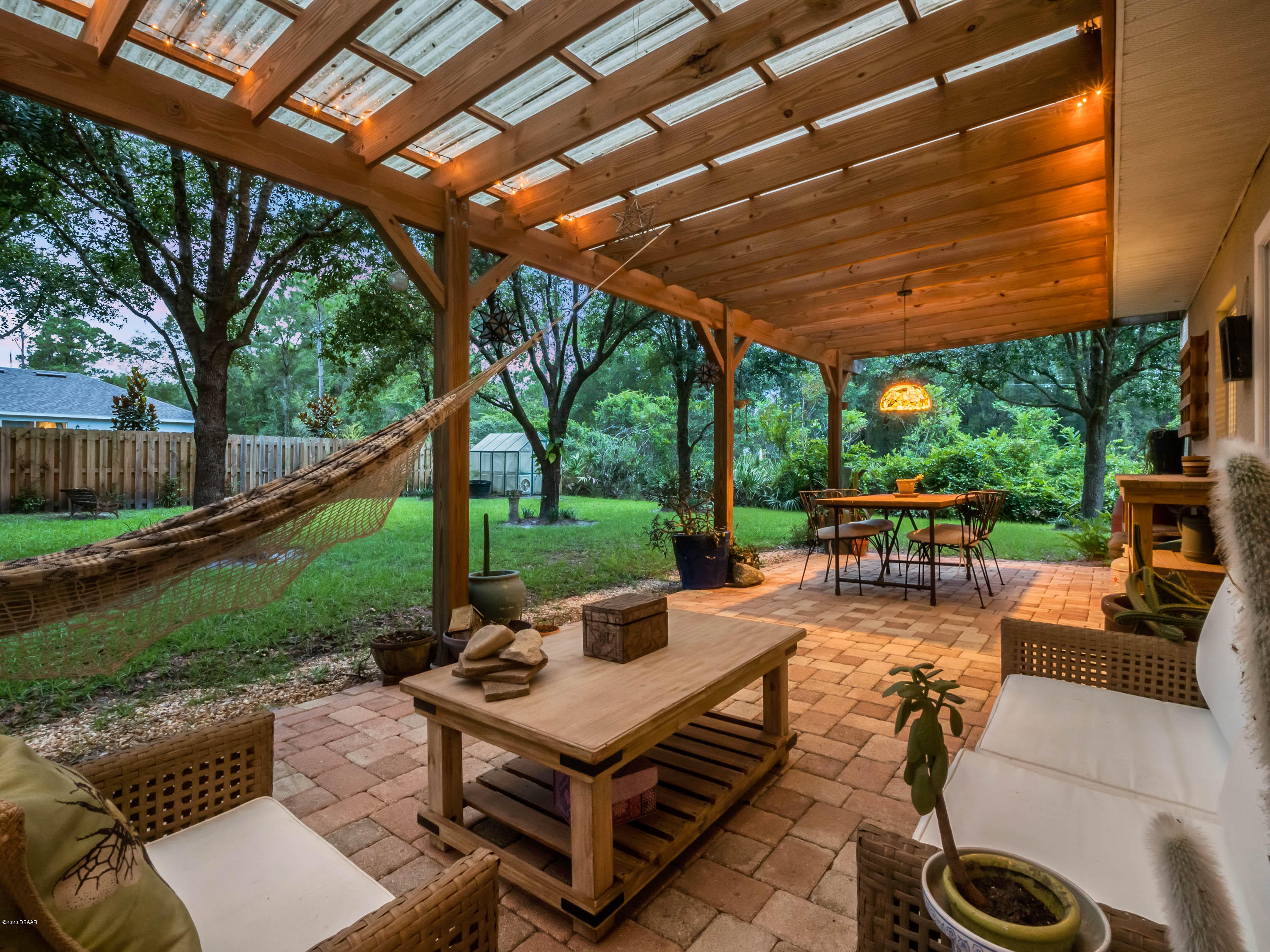 1982 7th Avenue DeLand, FL 32724 - Photo 31 of 36 a backyard of a house with outdoor seating