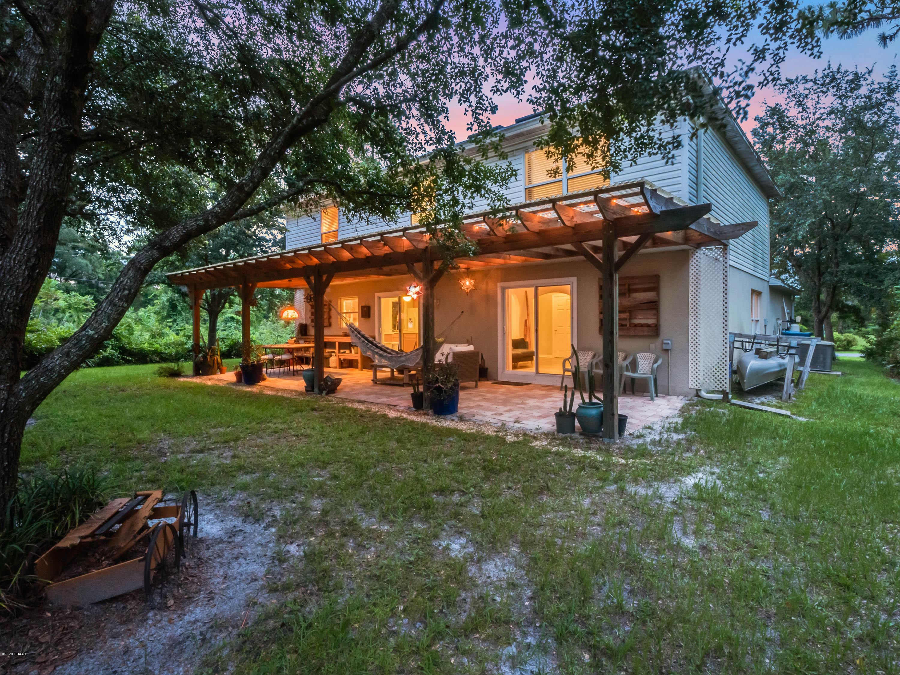 1982 7th Avenue DeLand, FL 32724 - Photo 35 of 36 a view of a house with backyard and porch