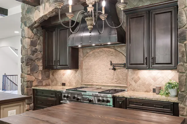 a bathroom with a double vanity sink a mirror and a bathtub