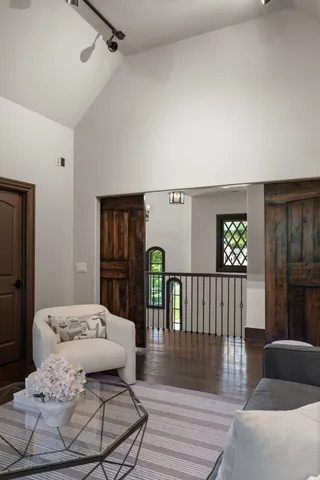 a aerial view of a house with a yard porch and sitting area