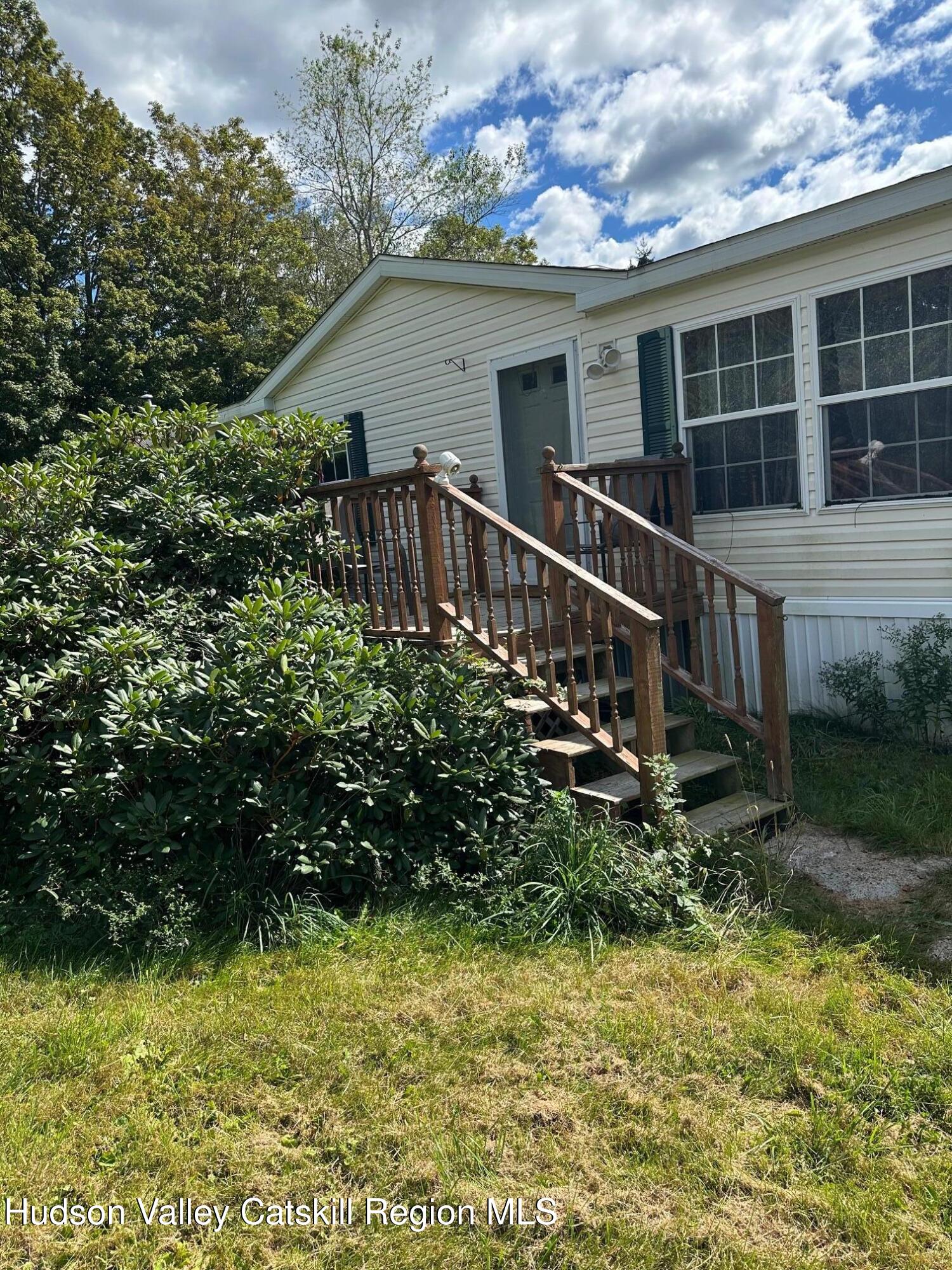 3285 Middlebrook Hill Road Jefferson, NY 12093 - Photo 1 of 16 a backyard of a house with lots of green space