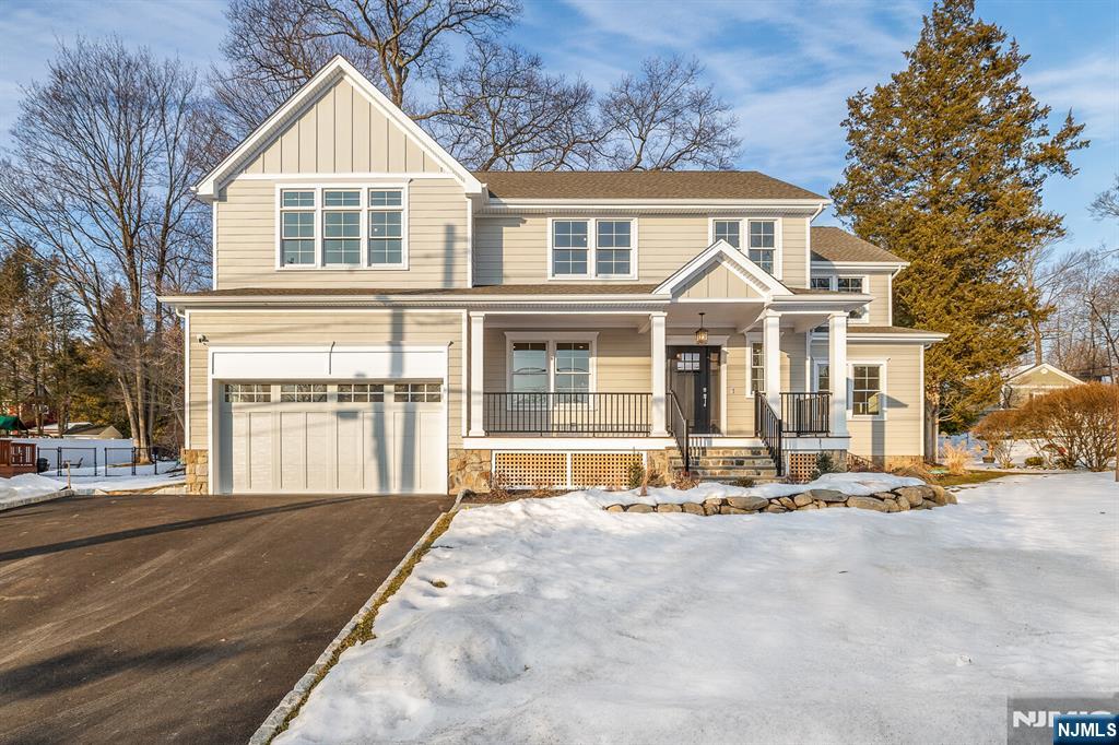 62 Colony Avenue Park Ridge, NJ 07656 - Photo 1 of 50 a front view of a house