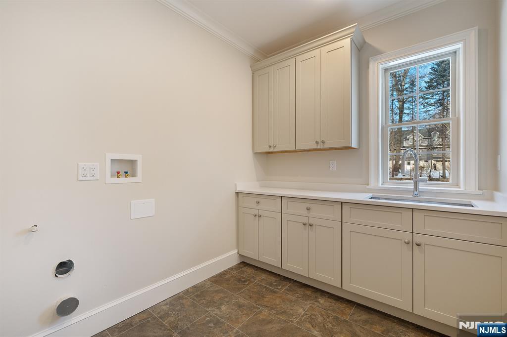 62 Colony Avenue Park Ridge, NJ 07656 - Photo 25 of 50 a room with cabinets and window