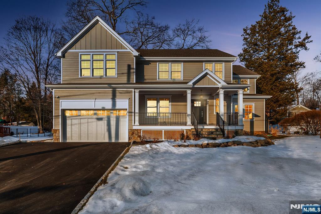 62 Colony Avenue Park Ridge, NJ 07656 - Photo 3 of 50 a front view of a house with a yard
