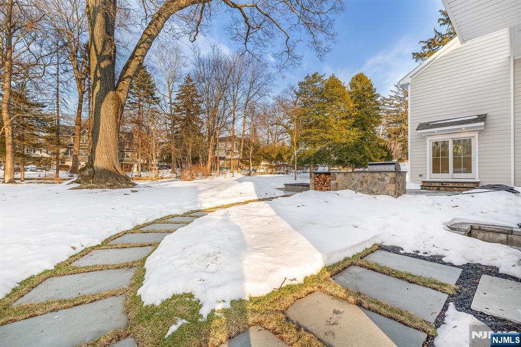 62 Colony Avenue Park Ridge, NJ 07656 - Photo 46 of 50 a view of a house with snow on the road