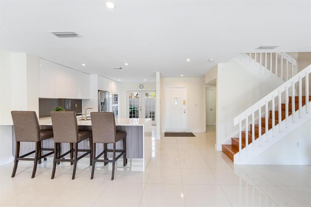 9703 Southwest 142nd Court Miami, FL 33186 - Photo 14 of 36 a view of a dining room with furniture