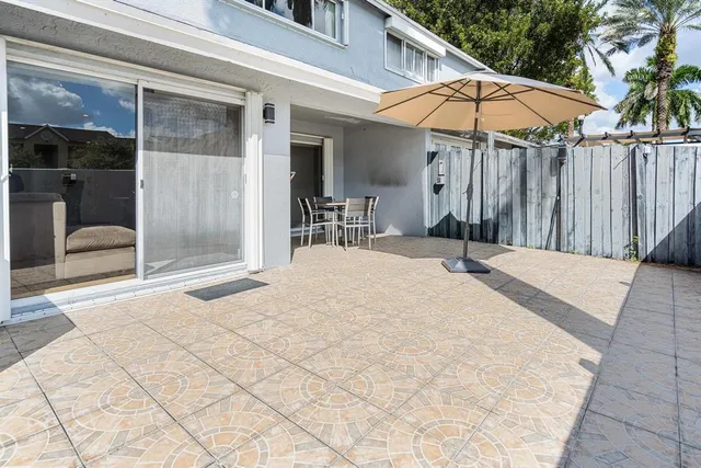 a white house with a outdoor space