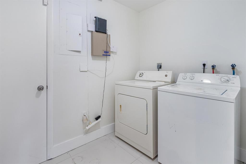 9703 Southwest 142nd Court Miami, FL 33186 - Photo 34 of 36 a utility room with dryer and washer