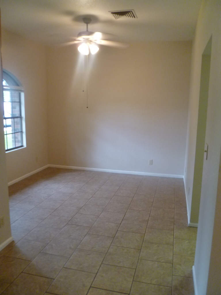 255 North Concord Street Gilbert, AZ 85234 - Photo 13 of 20 an empty room with windows and entrance