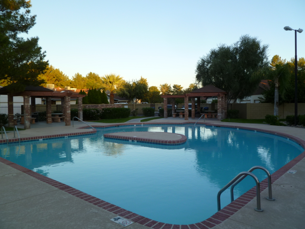 255 North Concord Street Gilbert, AZ 85234 - Photo 19 of 20 a view of swimming pool with outdoor seating and lake view