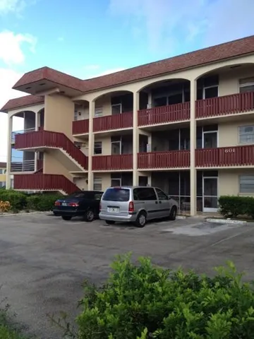 a car parked in front of a house