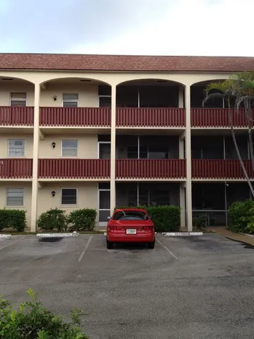 a car parked in front of a house