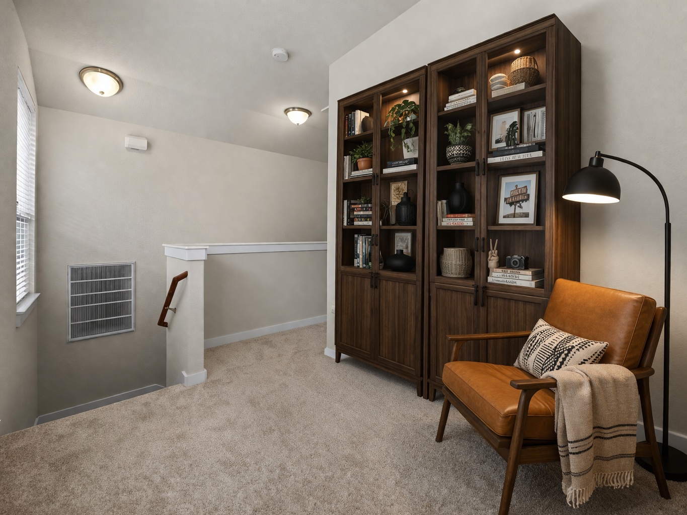 2101 Rivers Edge Way, Unit 32 Austin, TX 78741 - Photo 15 of 24 Virtually staged landing at top of stairs.