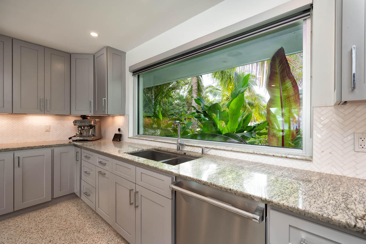 30680 Winifred Street Big Pine Key, FL 33043 - Photo 13 of 73 a kitchen with a sink and large window