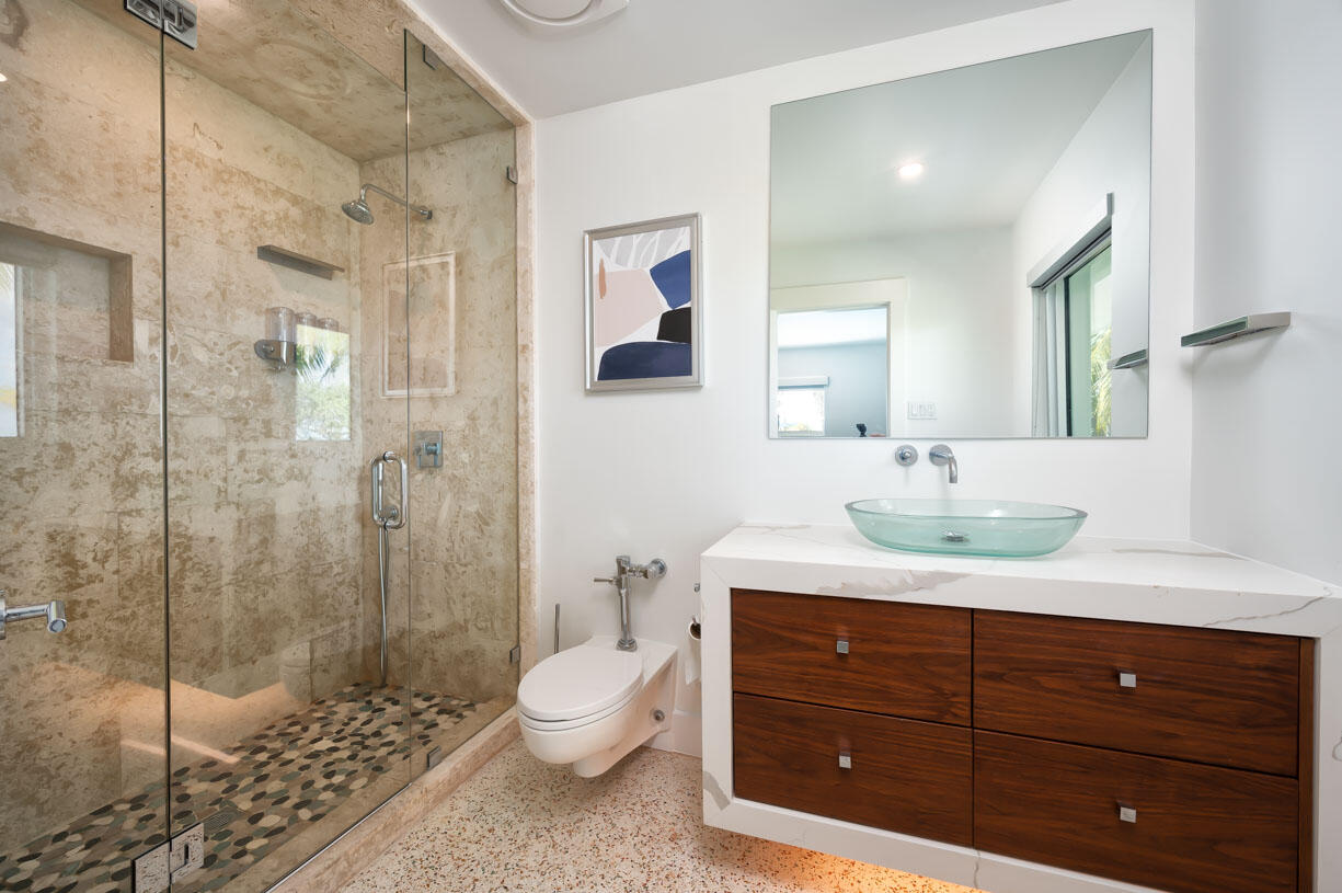 30680 Winifred Street Big Pine Key, FL 33043 - Photo 18 of 73 a spacious bathroom with a sink a toilet and shower