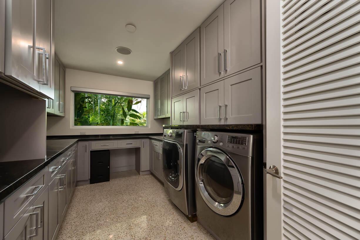 30680 Winifred Street Big Pine Key, FL 33043 - Photo 24 of 73 a view of a kitchen with washer and dryer