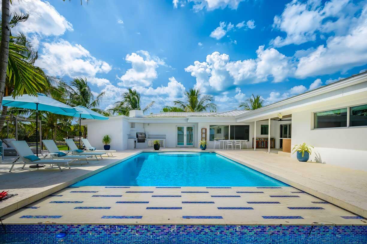 30680 Winifred Street Big Pine Key, FL 33043 - Photo 43 of 73 a view of a house with pool and chairs
