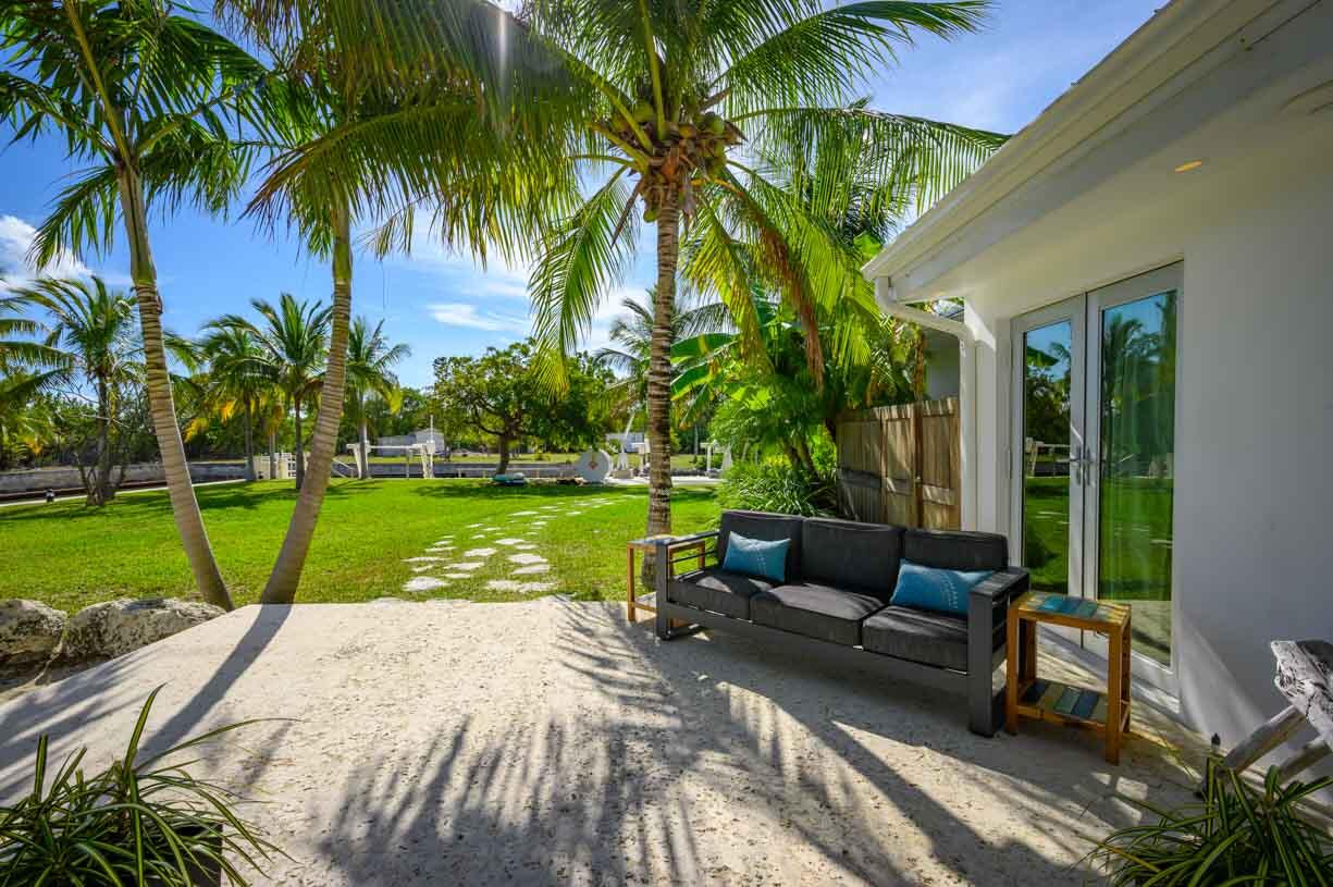 30680 Winifred Street Big Pine Key, FL 33043 - Photo 57 of 73 a view of a garden with a patio