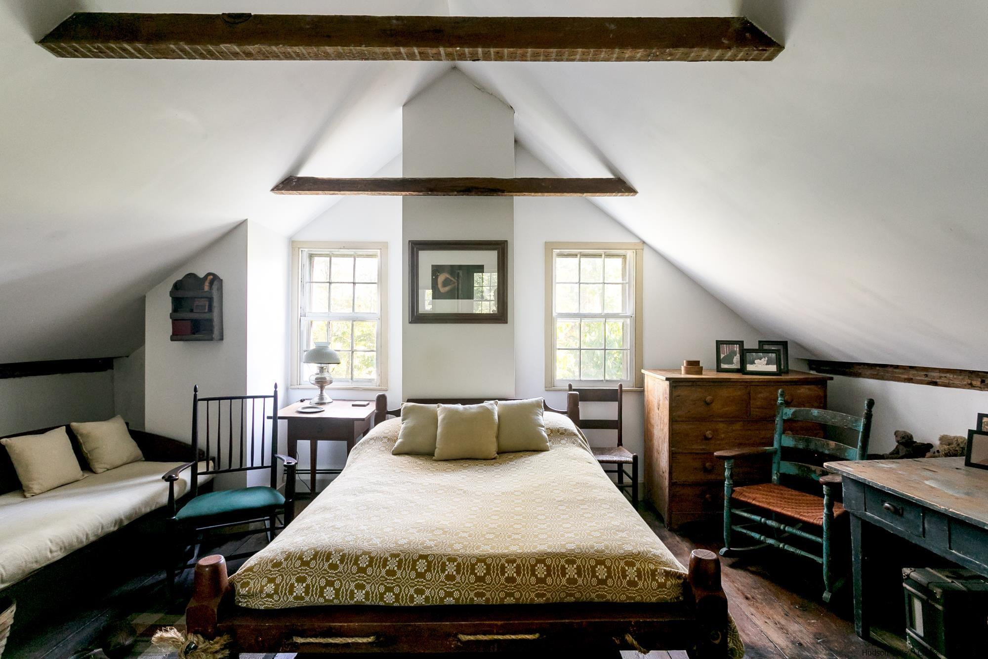 169 Marcott Road Kingston, NY 12401 - Photo 12 of 32 a bedroom with a bed and wooden floor