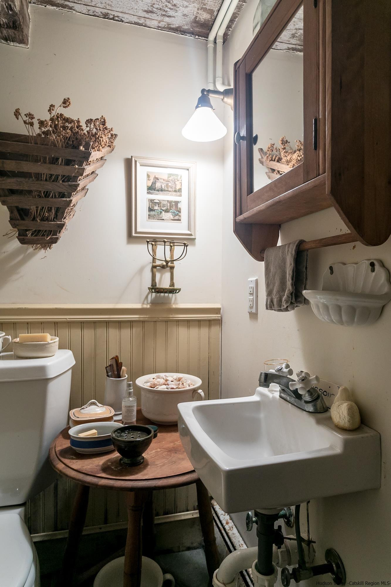 169 Marcott Road Kingston, NY 12401 - Photo 19 of 32 a view of a dining room with furniture and chandelier