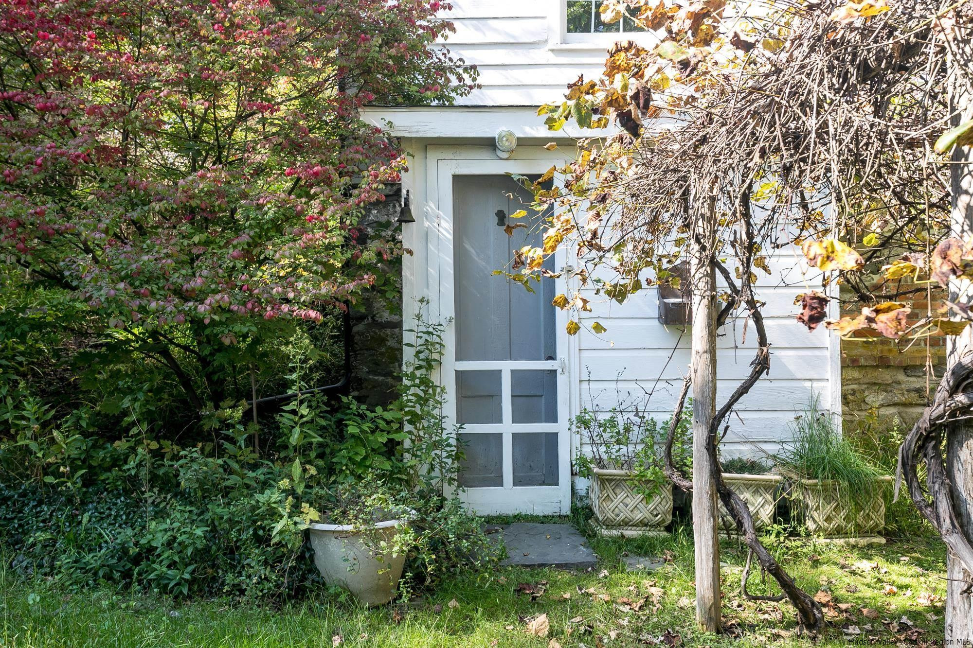 169 Marcott Road Kingston, NY 12401 - Photo 24 of 32 a front view of a house with garden