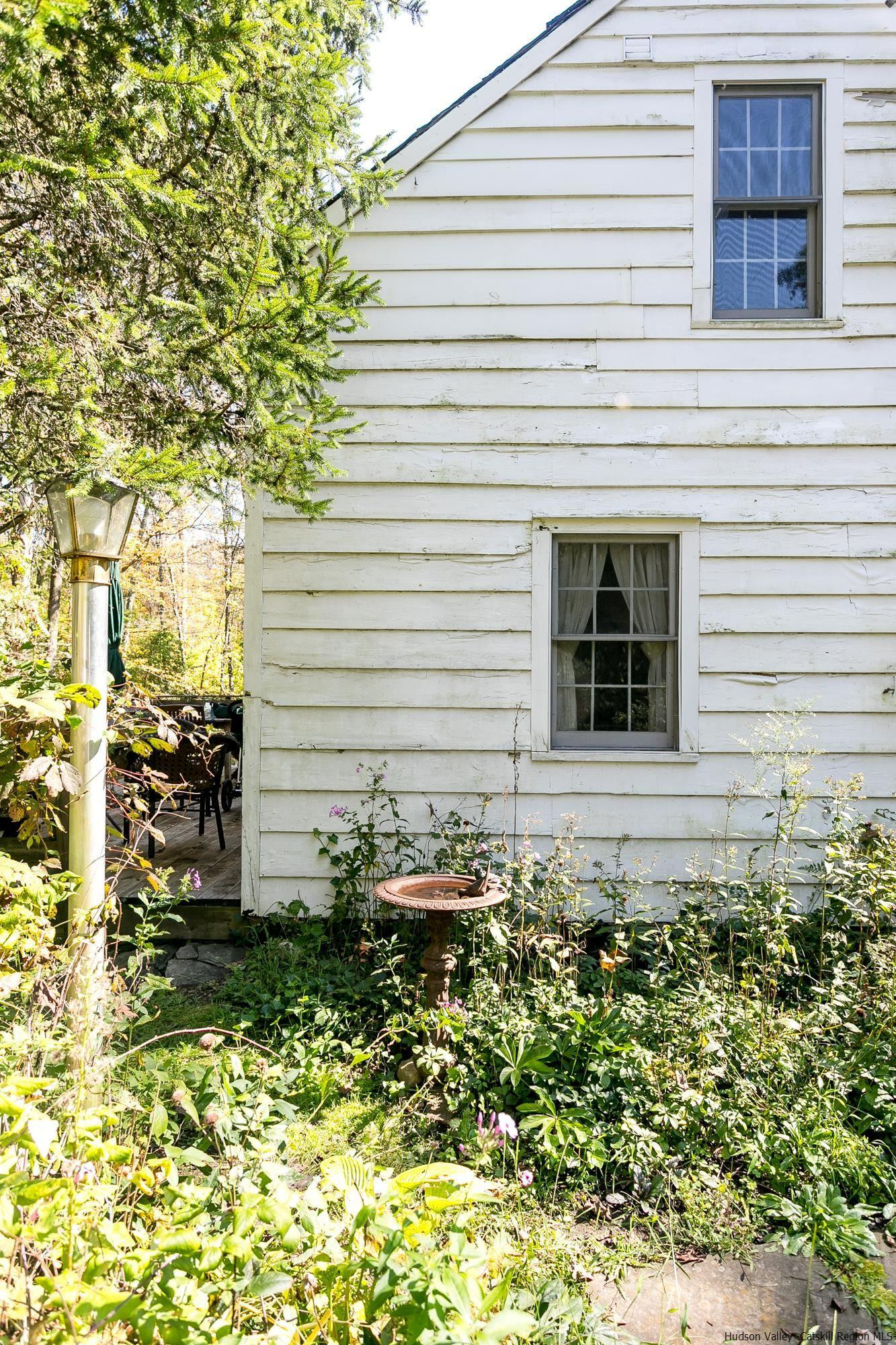 169 Marcott Road Kingston, NY 12401 - Photo 26 of 32 a view of a backyard with plants