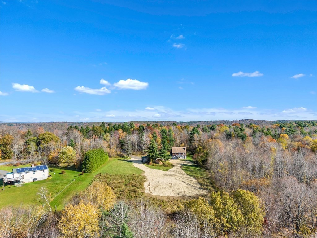 145 Chester Road Blandford, MA 01008 - Photo 13 of 34 a view of a lake with a yard