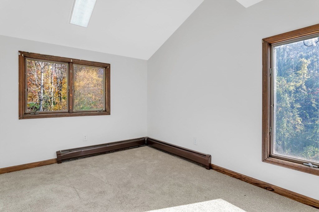 145 Chester Road Blandford, MA 01008 - Photo 31 of 34 a view of an empty room with a window
