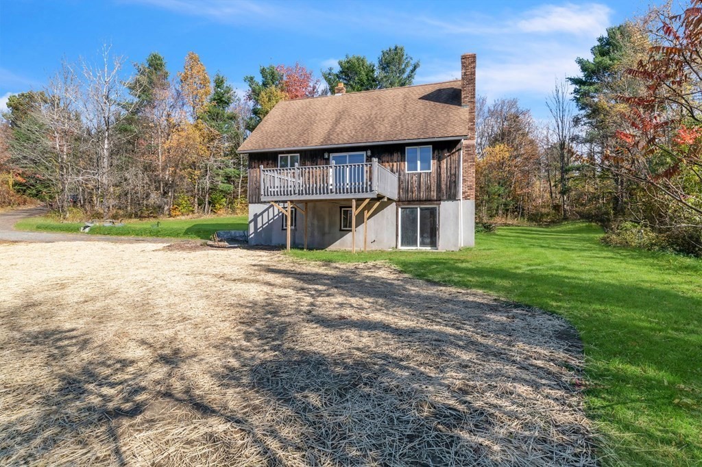 145 Chester Road Blandford, MA 01008 - Photo 5 of 34 a view of a house with a yard and tree s