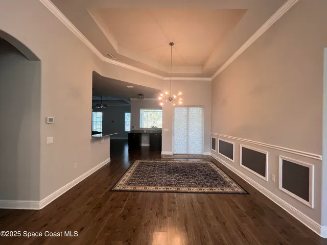 a view of a kitchen with a sink and dishwasher