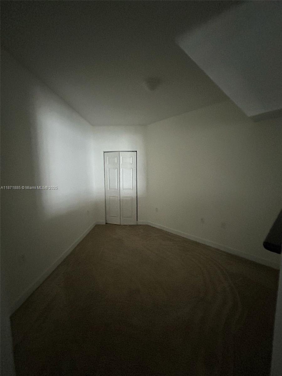 140 South Dixie Highway, Unit 816 Hollywood, FL 33020 - Photo 6 of 9 a view of an empty room and window