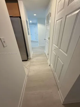 a view of hallway with stairs